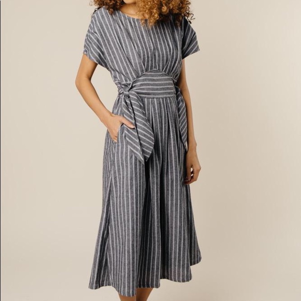 Striped dress with ties on sides.